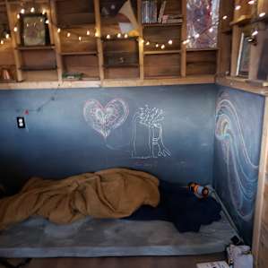 Area under the inverted tree house loft that fit one twin size mat for sleeping, lots of room!
