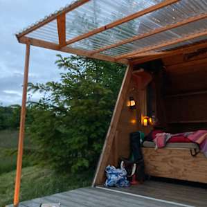 I bring a battery operated candle and twinkle lights on all my stays for a cosy feel. Don’t forget a headlamp!