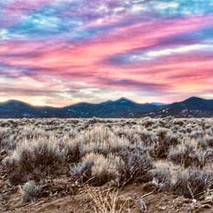 Sunrise skies over the mountain range