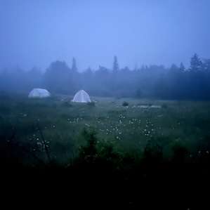 Foggy nighttime view of the farm from near one of the platform campsites.