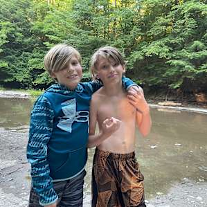 Catching critters in the creek.