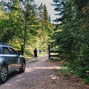 Opening the gate on our way out - we made it up in a Subaru Outback