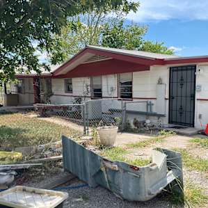 House next to available space.