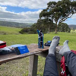 Relaxing near the Swag, there is a bench seat at each site.