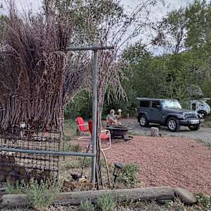 Shaded Camp site on gentle canal