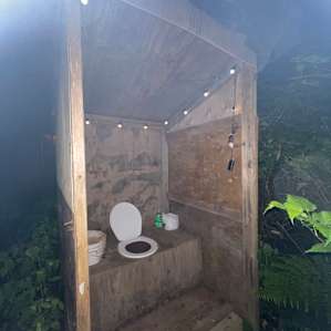Outhouse (equipped with hand sanitizer, TP, and sawdust for controlling odour)