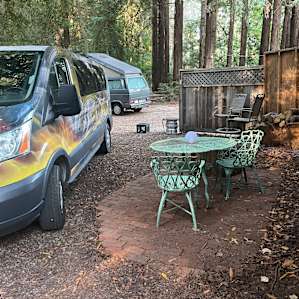 Nice table amd chairs but right next to another camper.
