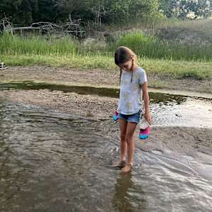 The river was creek size, and perfect for young kids to play in and the adults lounge in