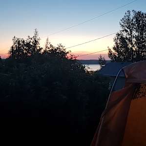 Set up camp at the top by the road, with view of the lake
