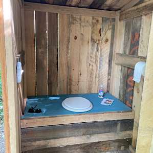 Clean individual outhouse per site