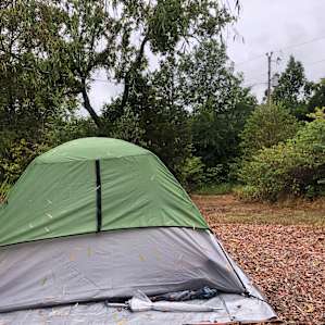 Lovely camp set up. Fire pit and picnic table provided!