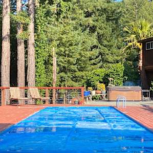 pool surrounded by nature. you are in a forest! so you may see a spider but that's what happens in nature. There's not a lot of spiders, but you may see 1.