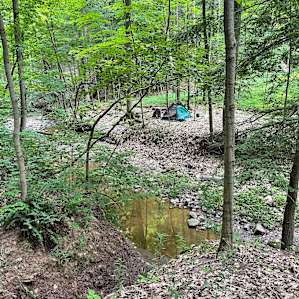 Campsite by the creek. You have to go down on the landscaped path/steps