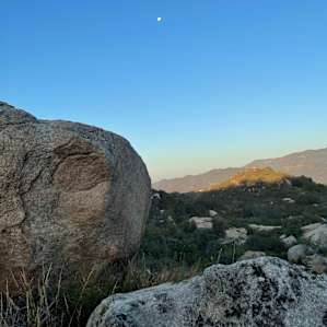 Large boulders are scattered throughout the landscape.