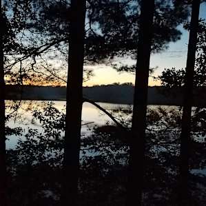 Another sunset. The only thing missing is the sound of the loons/owls/tree frogs calling. Wonderful.