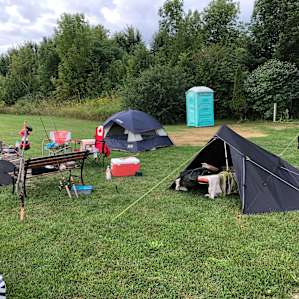Two shelters, one camper