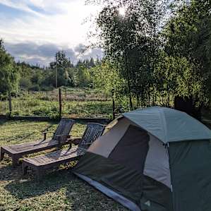 The site was very large (includes fire pit, chairs and table) but we chose to sleep closer to the goats for more level ground. The sunrise was beautiful!