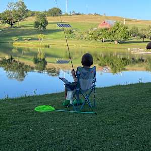 Loving life, fishing on the pond