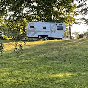 Our campsite area complete with electric, potable water, porta potty, gray water disposal and fire wood!