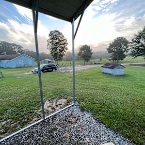 RV STEPS AWAY FROM BARN