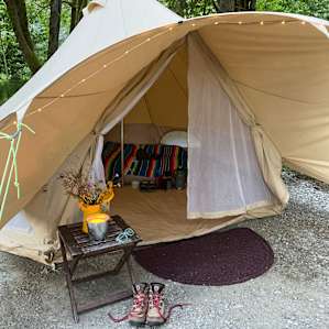 Two Bell Tents in Tranquil Forest