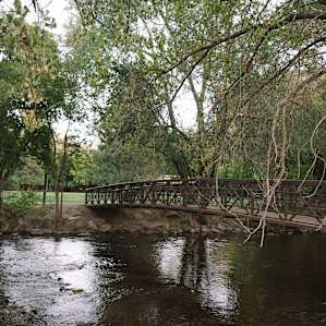 The peaceful stream that runs just behind the property.