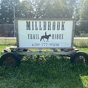 The sign near the front of the property.