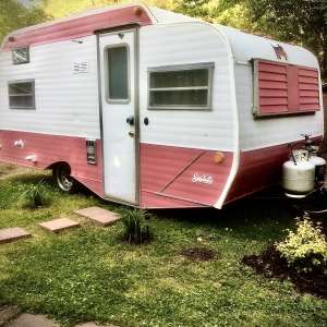 1974 Pink & White Scotty Camper