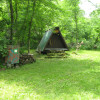 WOODEN TENT IN THE WOODS