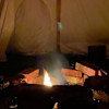 tipi by the stream