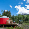 The Off-Grid Red Yurt in the woods