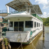 The Summertime Bayou Houseboat 