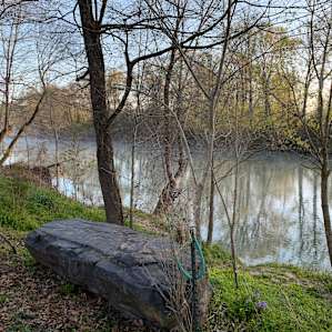 Site 13 - overlooks the beautiful river, has a perfect ledge for fishing or just sitting and enjoying the water