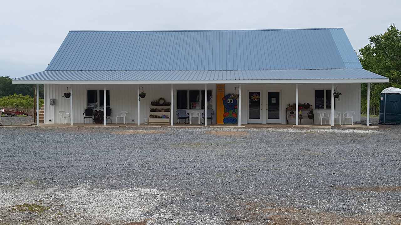 Renovated Marketplace -
This has water, bathroom, kitchen facility, heat and air. We rent for parties and events during the off season.