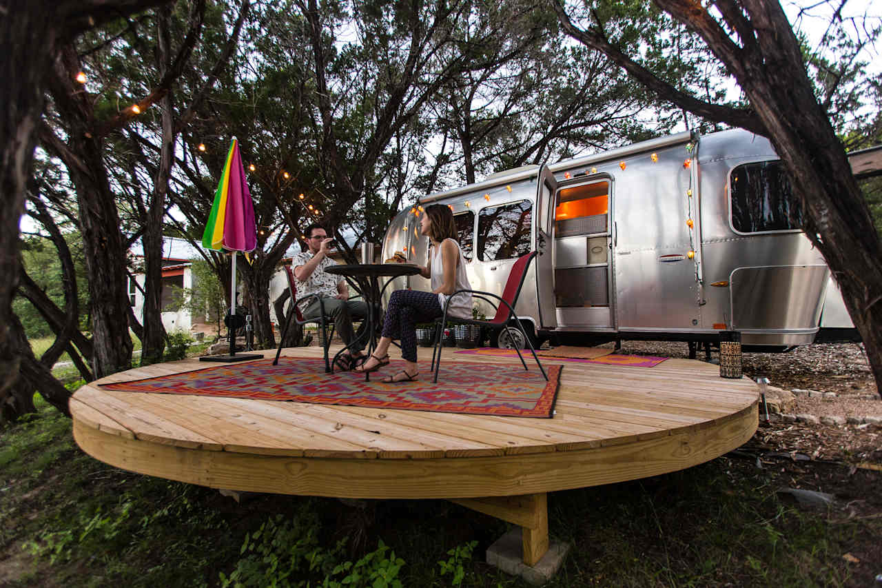 Enjoying dinner on the private platform deck outside the airstream.
