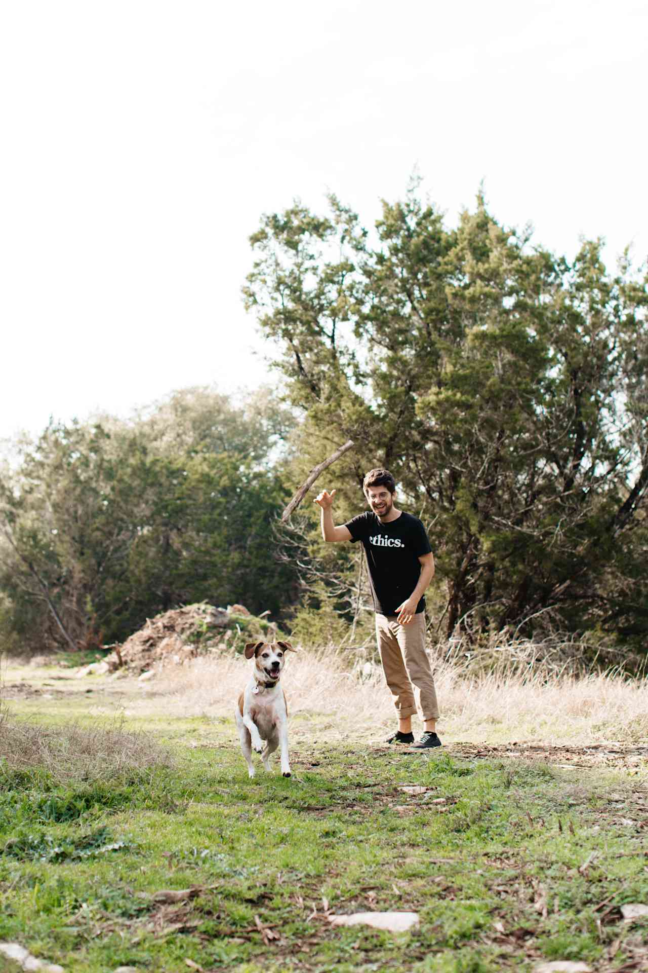 Playing fetch with sticks.