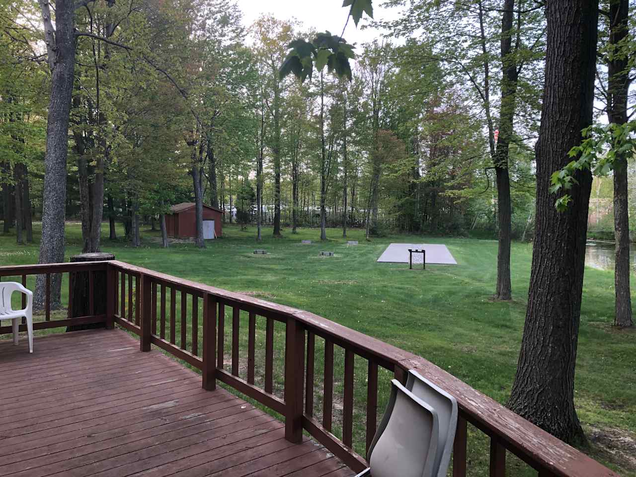 Horse shoe pits and shuffle boards from back of club house 