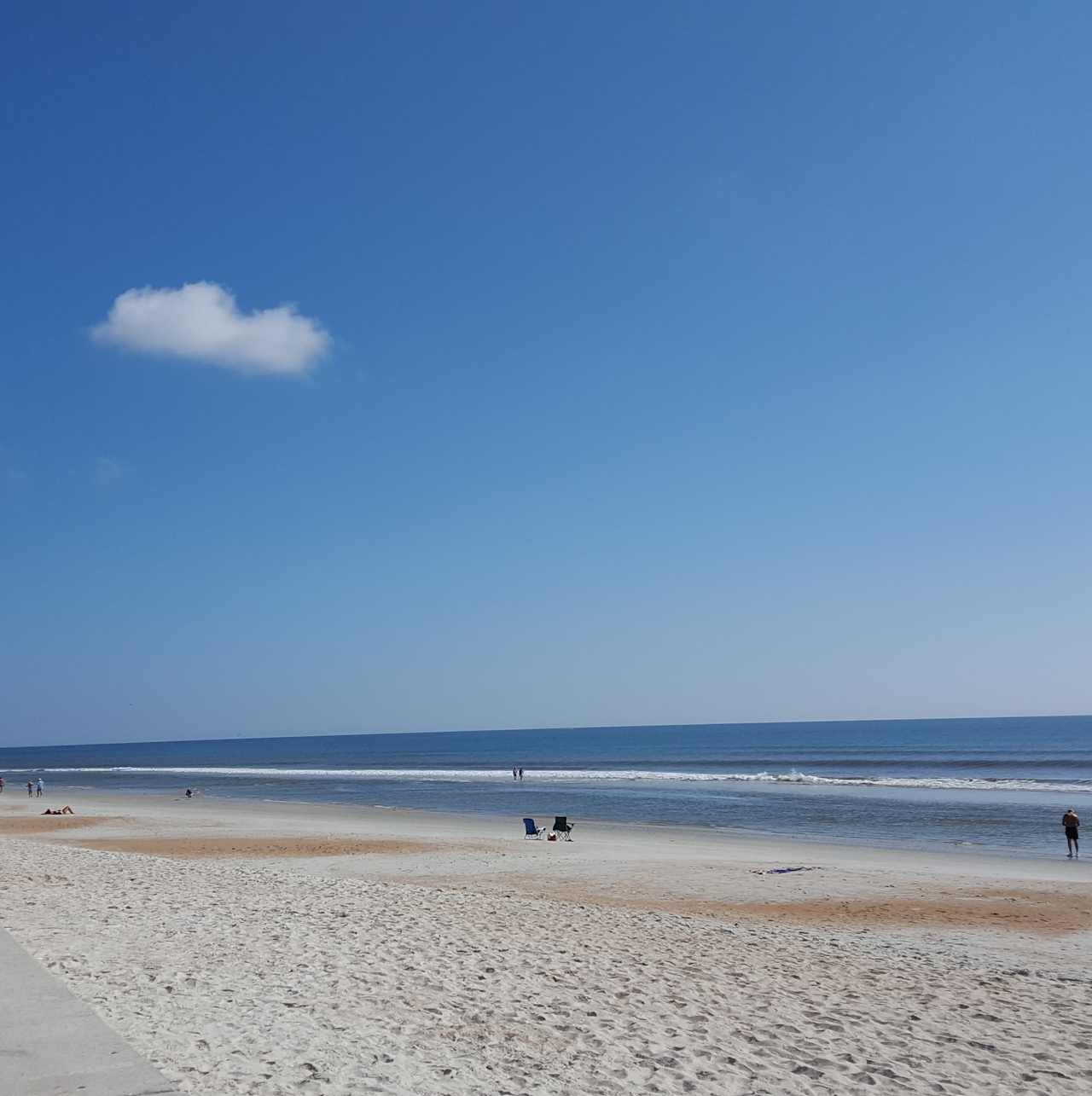 Walking distance to the beach. White sand, gentle surf and a long pier await you.