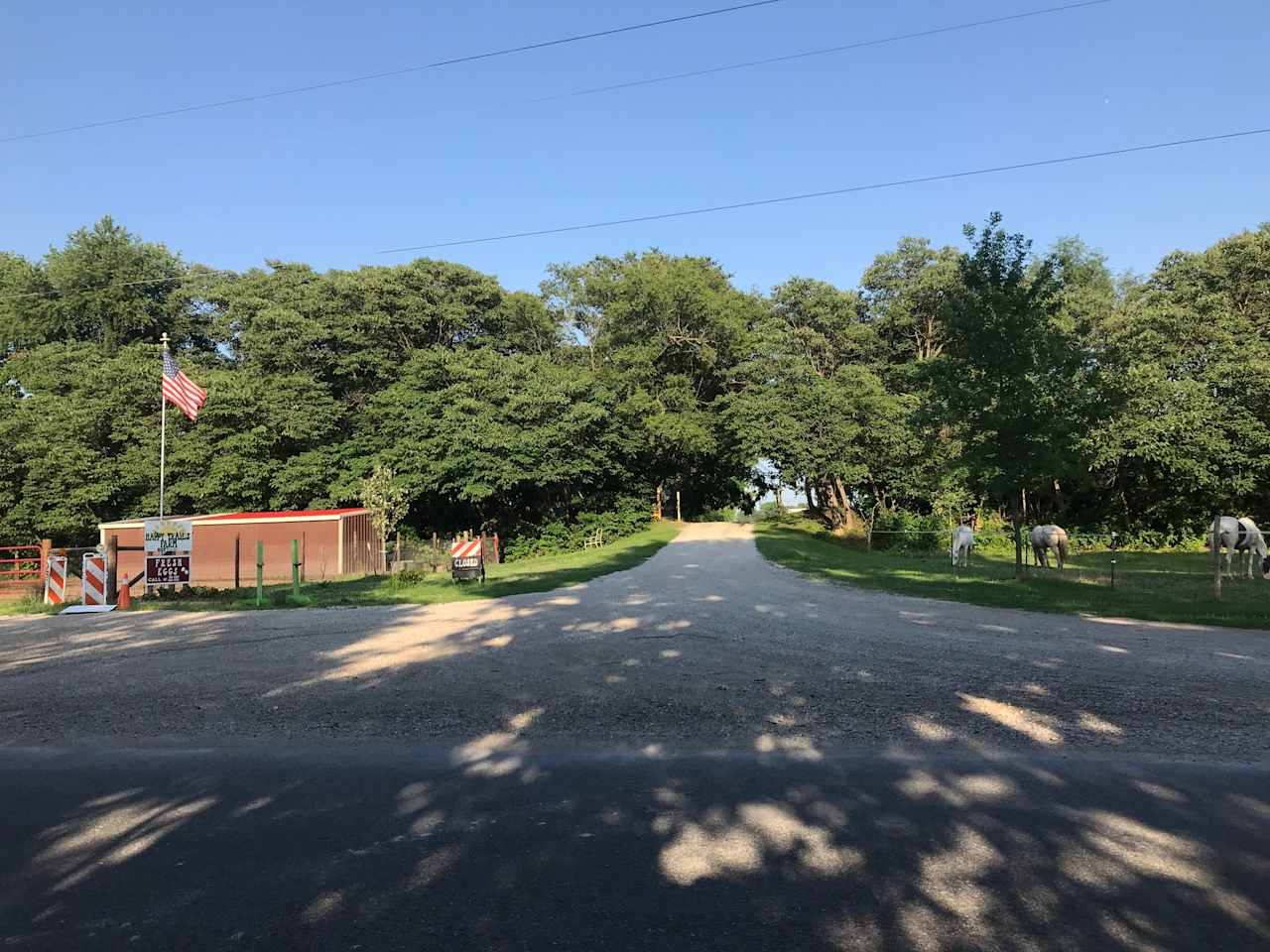 Front Entrance Road view, and graveled parking at pony pen.