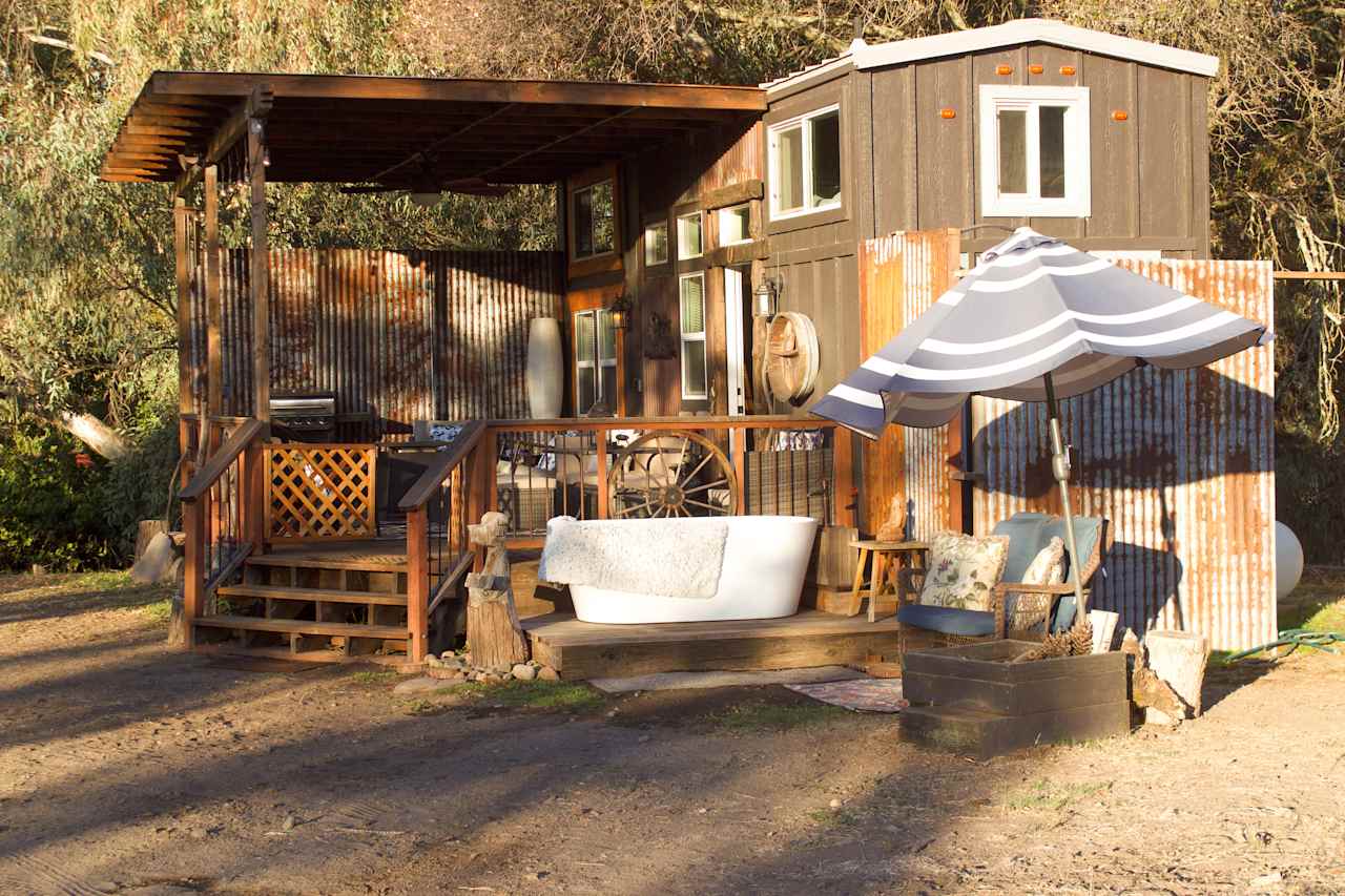 The tiny house, featuring our favorite spot. The outdoor bathtub. With that morning light setting in through the trees, this was the perfect place to start the day with a good soak and spectacular views.