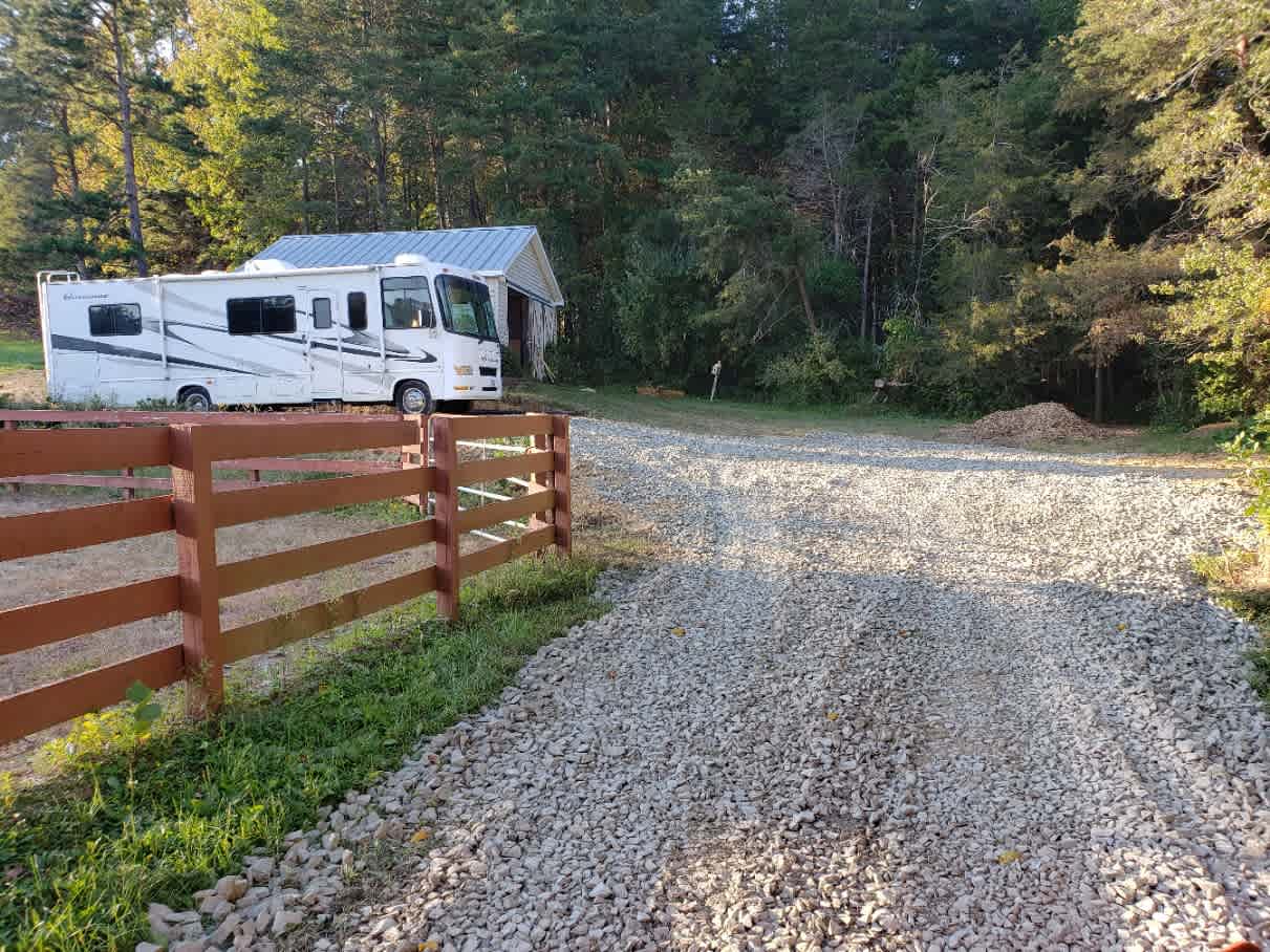 Tjhe site is down a 100 ft X 14 ft wide narrow drive. 