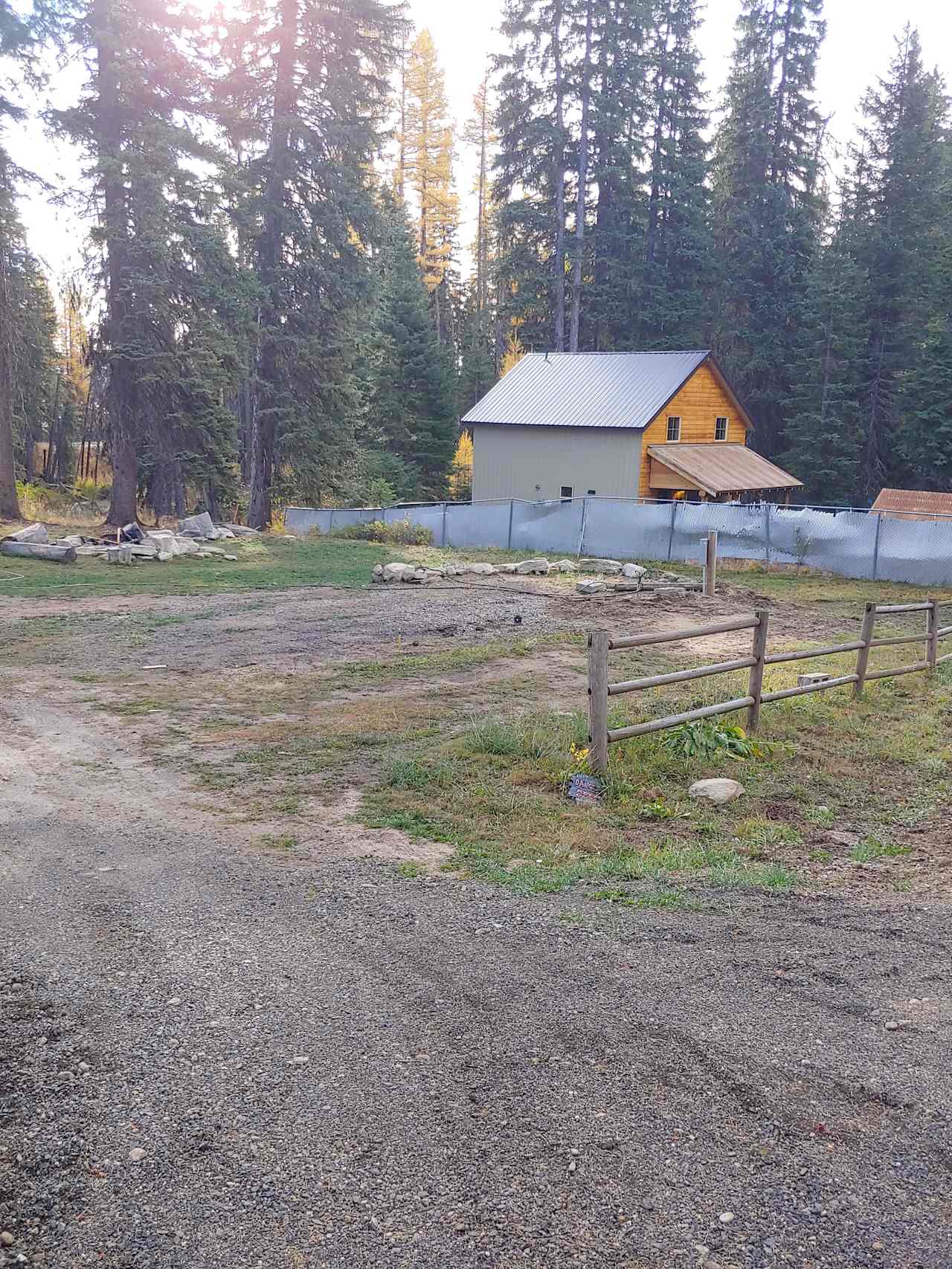 RV pad with hydrant, power supply, and sewer connection.