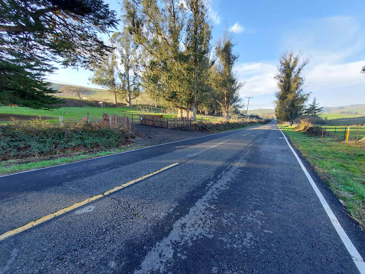 View of the driveway entrance coming from the south