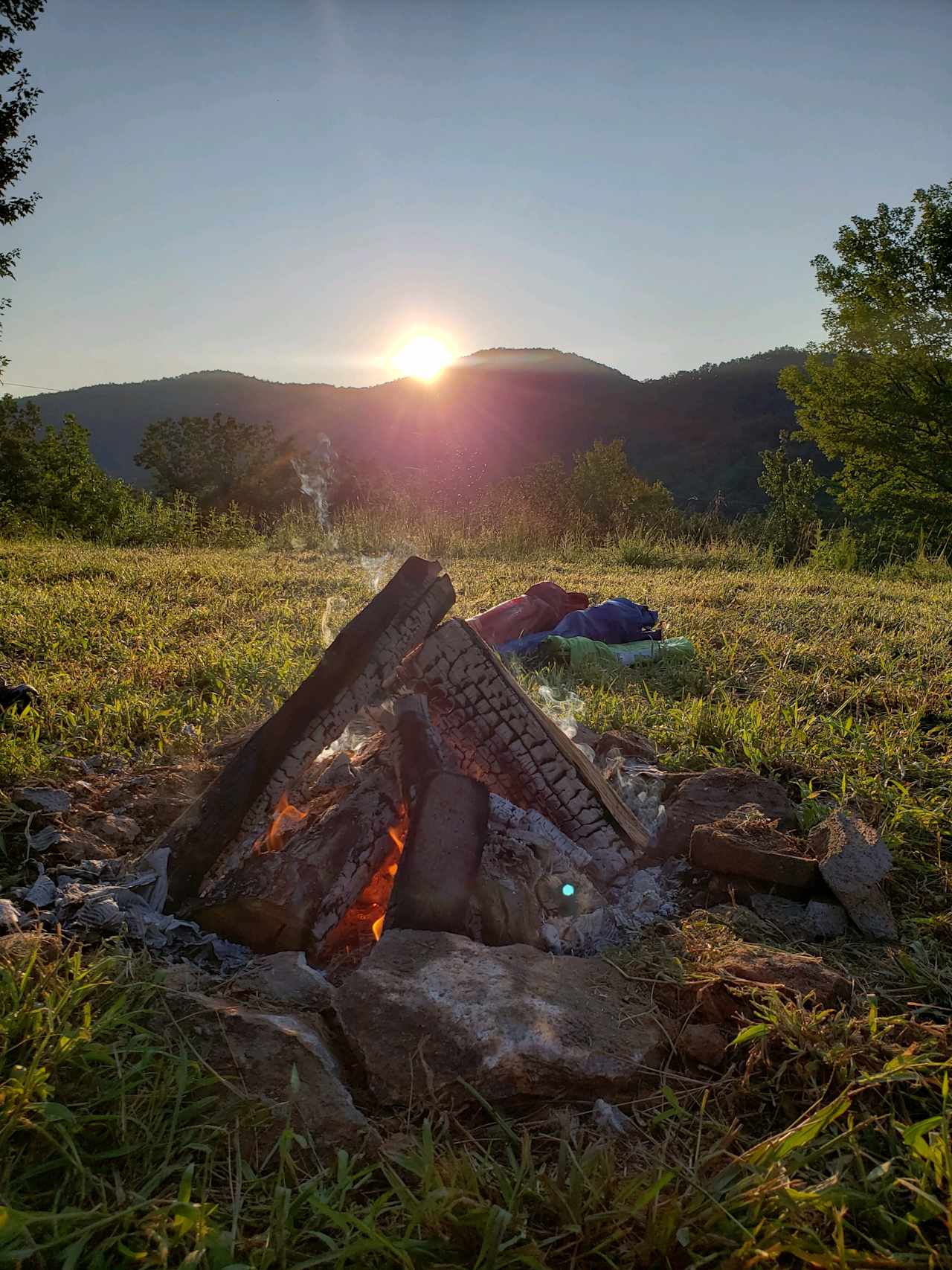 Campfire watching the sunrise at Campsite B.