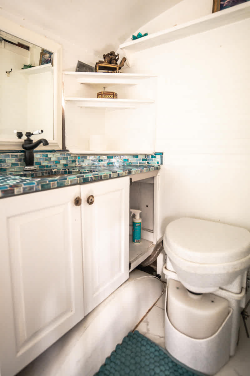 The bus bathroom is small but functional