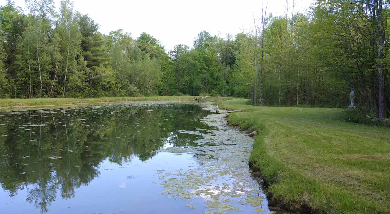 Tent camping next to private pond