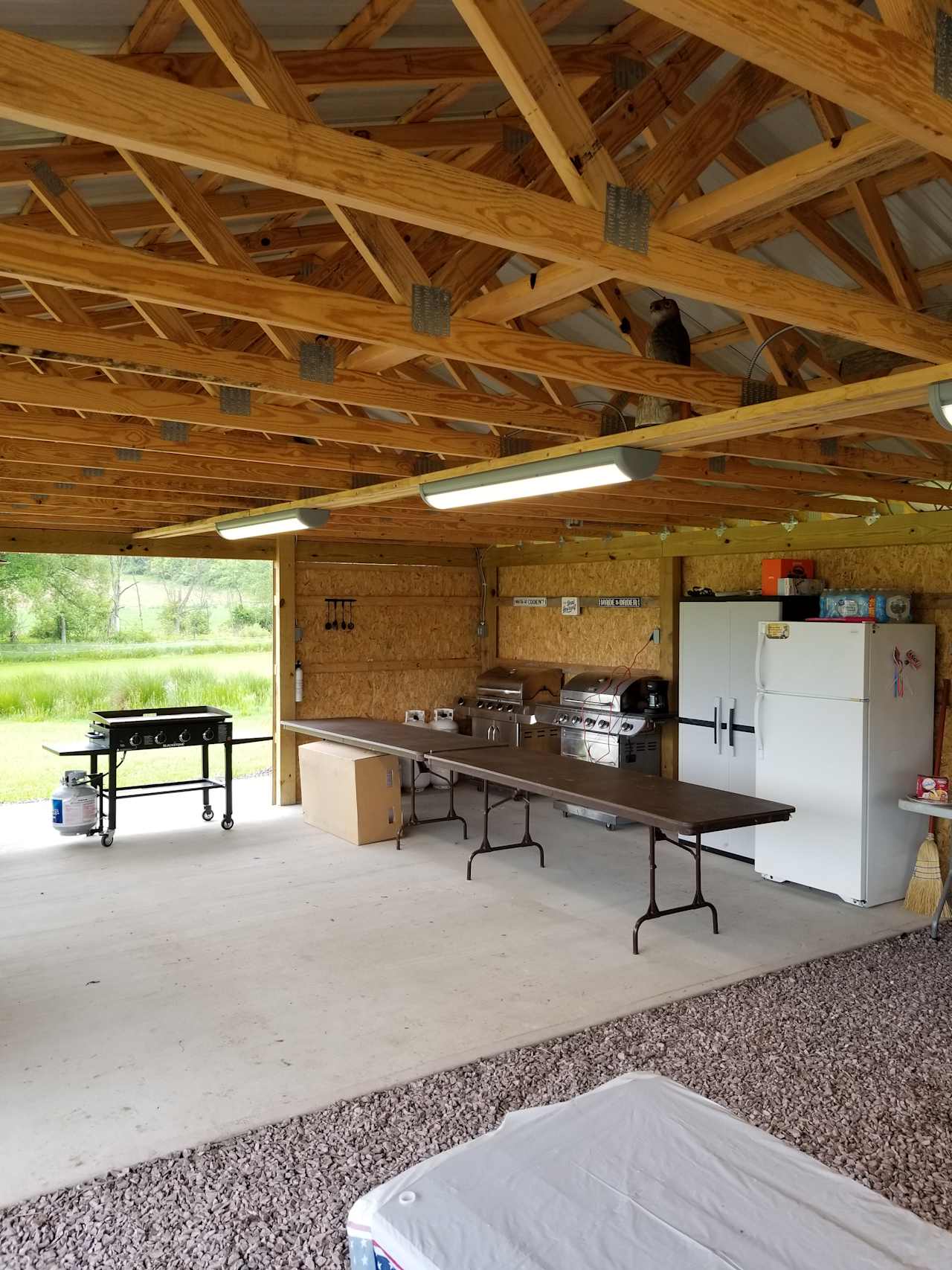 2 propane grills, flat top propane griddle, communal refrigerator