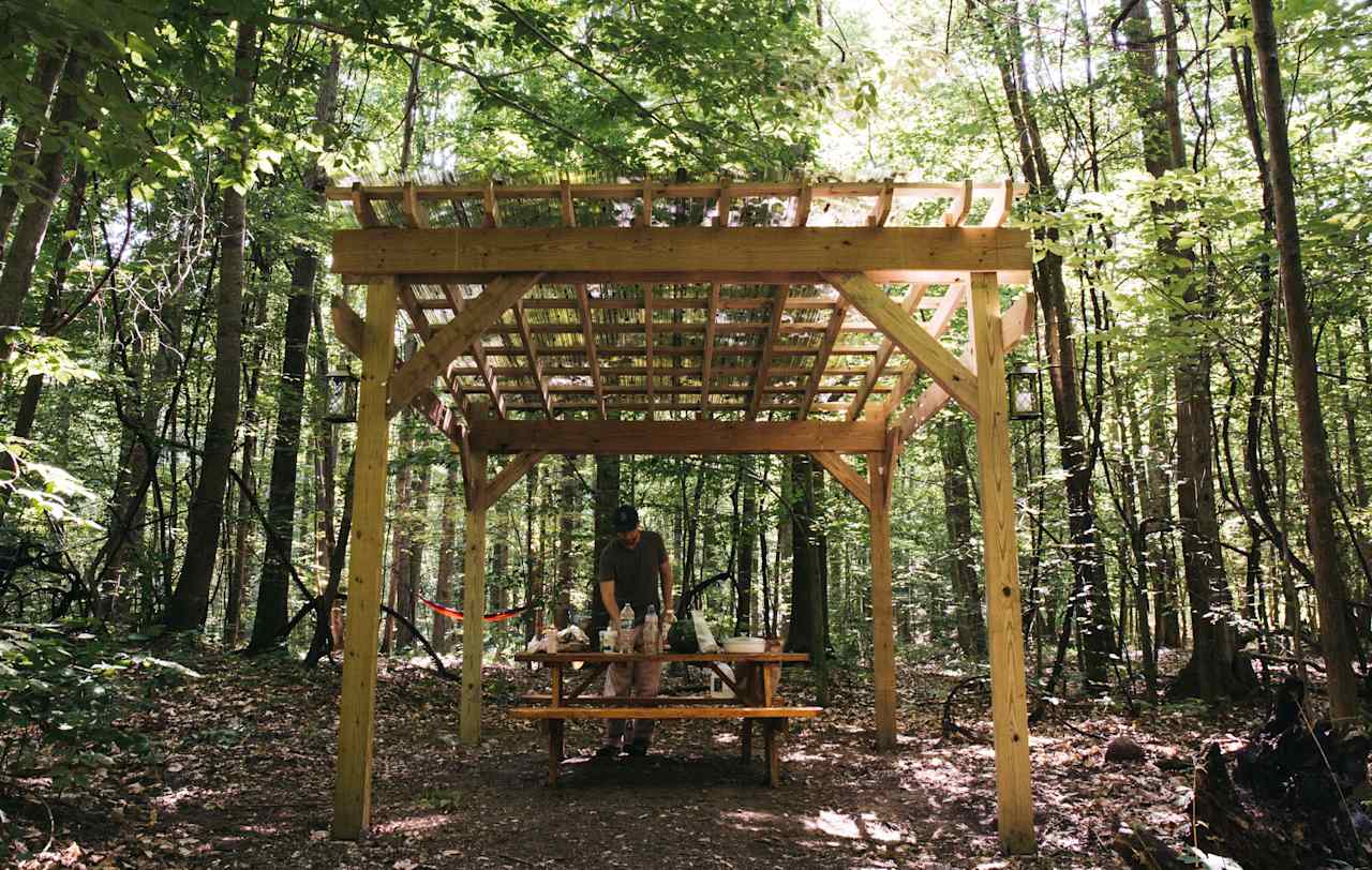 Cook, eat, relax and more under the pergola at site 2!