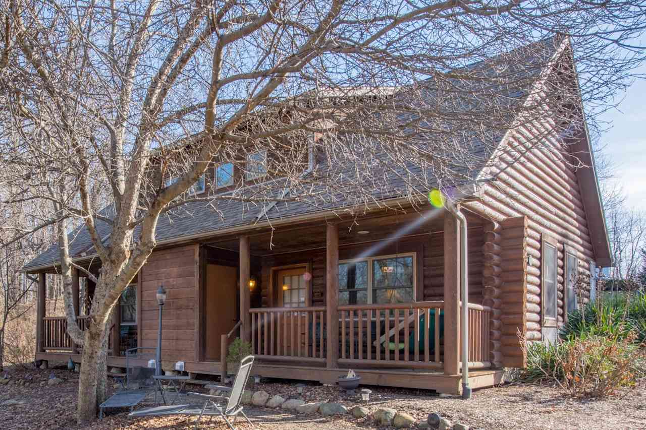 Harmony Suite front porch with porch swing.