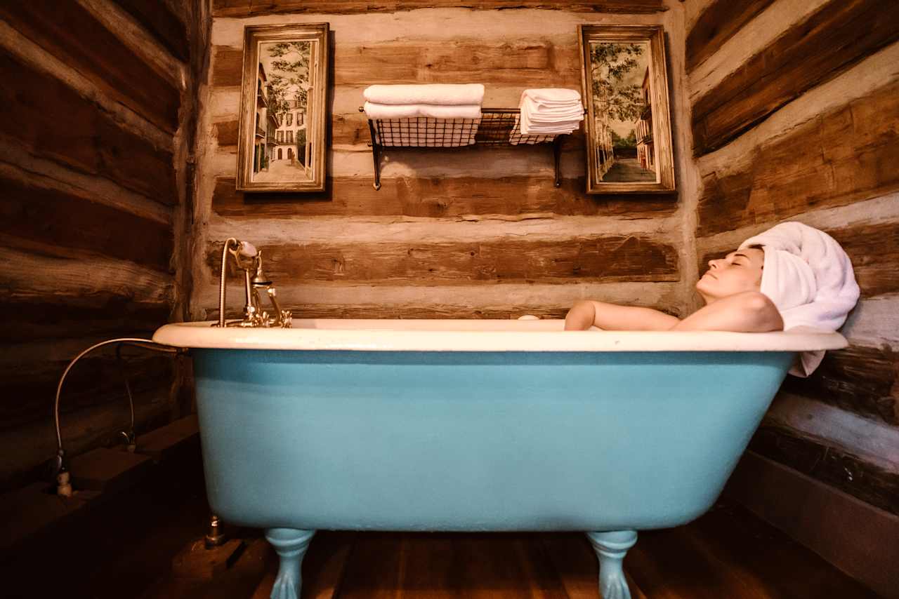 If you prefer a bath, you can take a soak in the antique clawfoot tub.